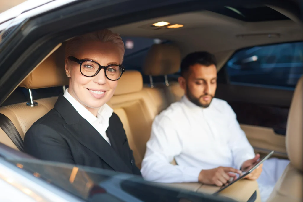 business-people-travelling-by-car-2025-02-11-15-32-31-utc-min
