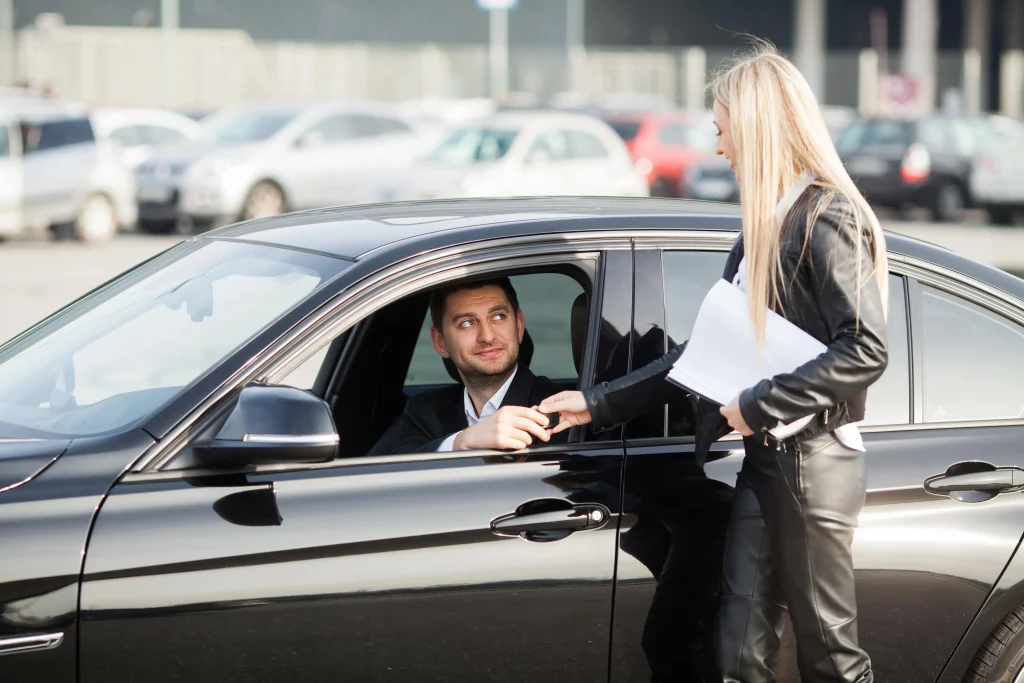 happy-couple-buy-new-modern-black-car-2025-02-12-17-28-46-utc-min