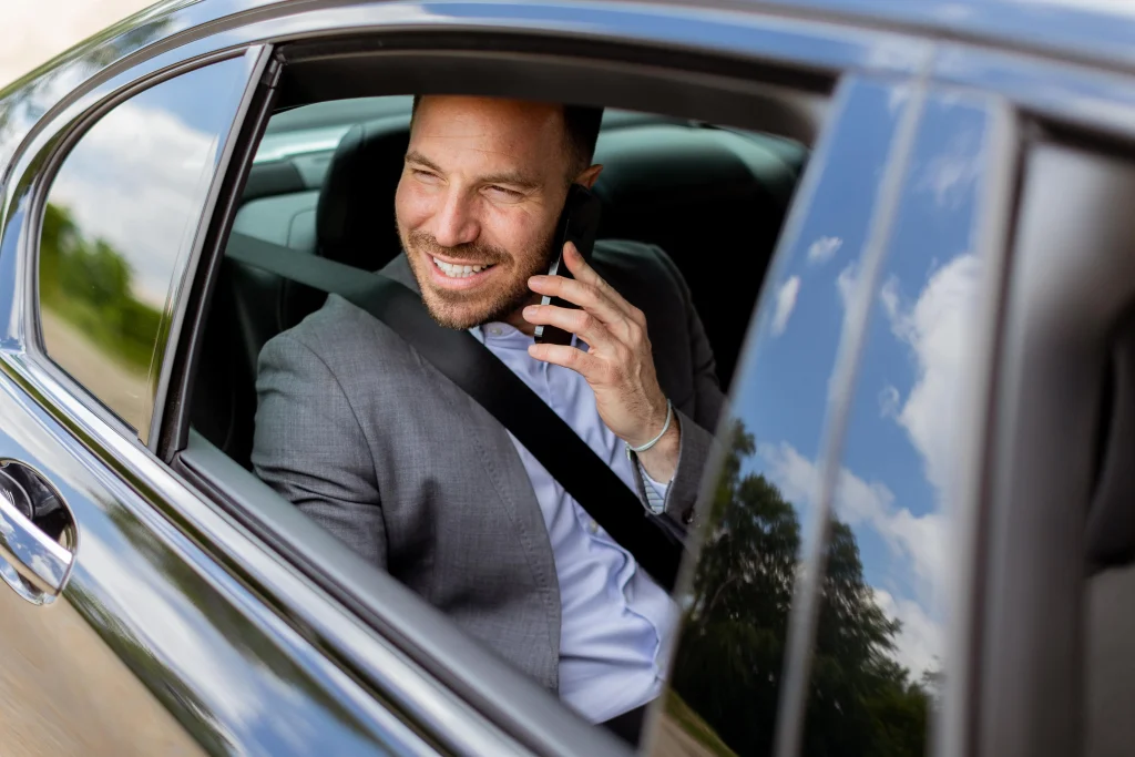 joyful-man-sharing-laughter-on-a-phone-call-while-2025-02-21-15-42-59-utc-min