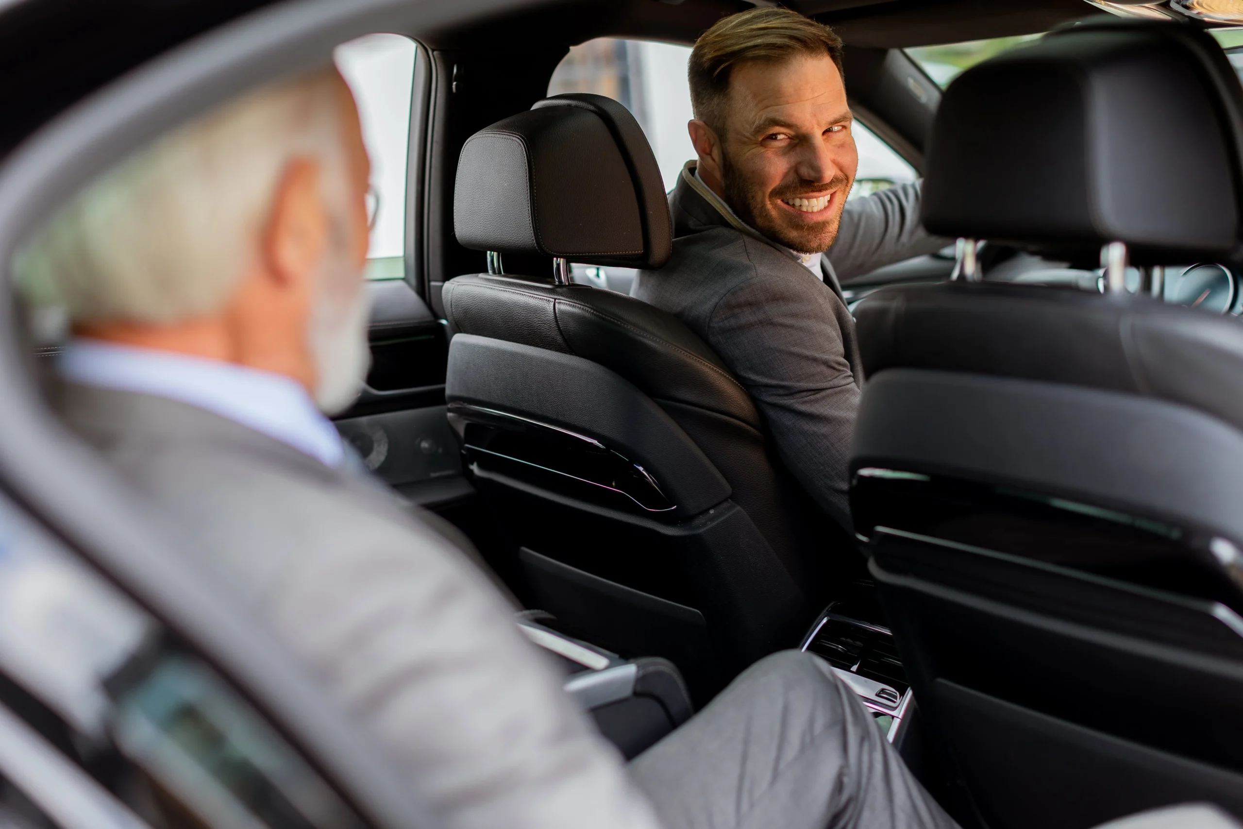 smiling-passenger-engaging-in-friendly-conversatio-2025-02-22-02-04-10-utc (1)-min