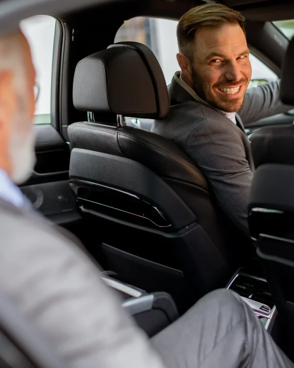smiling-passenger-engaging-in-friendly-conversatio-2025-02-22-02-04-10-utc (1)-min